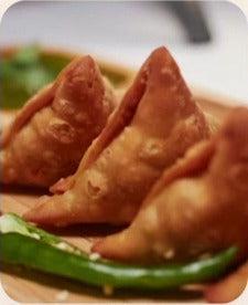 Fresh samosas and green chilli